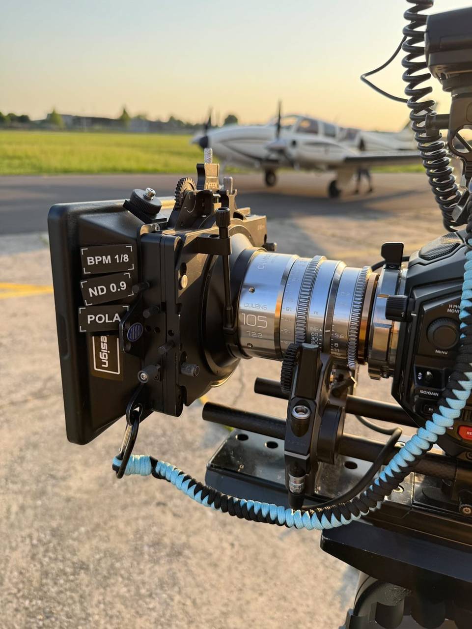 Camera lens closeup tarmac