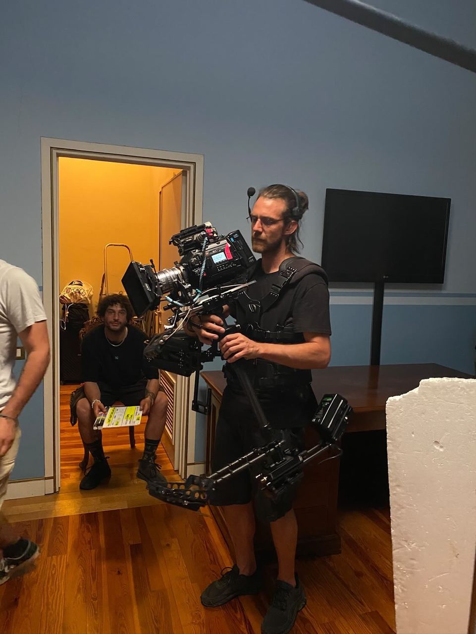 Crew carrying camera gear