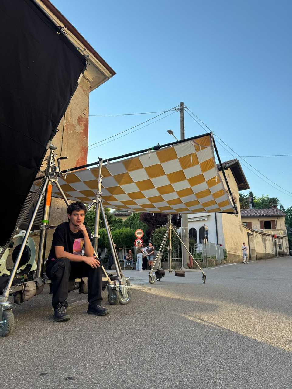 Crew resting checkered wall