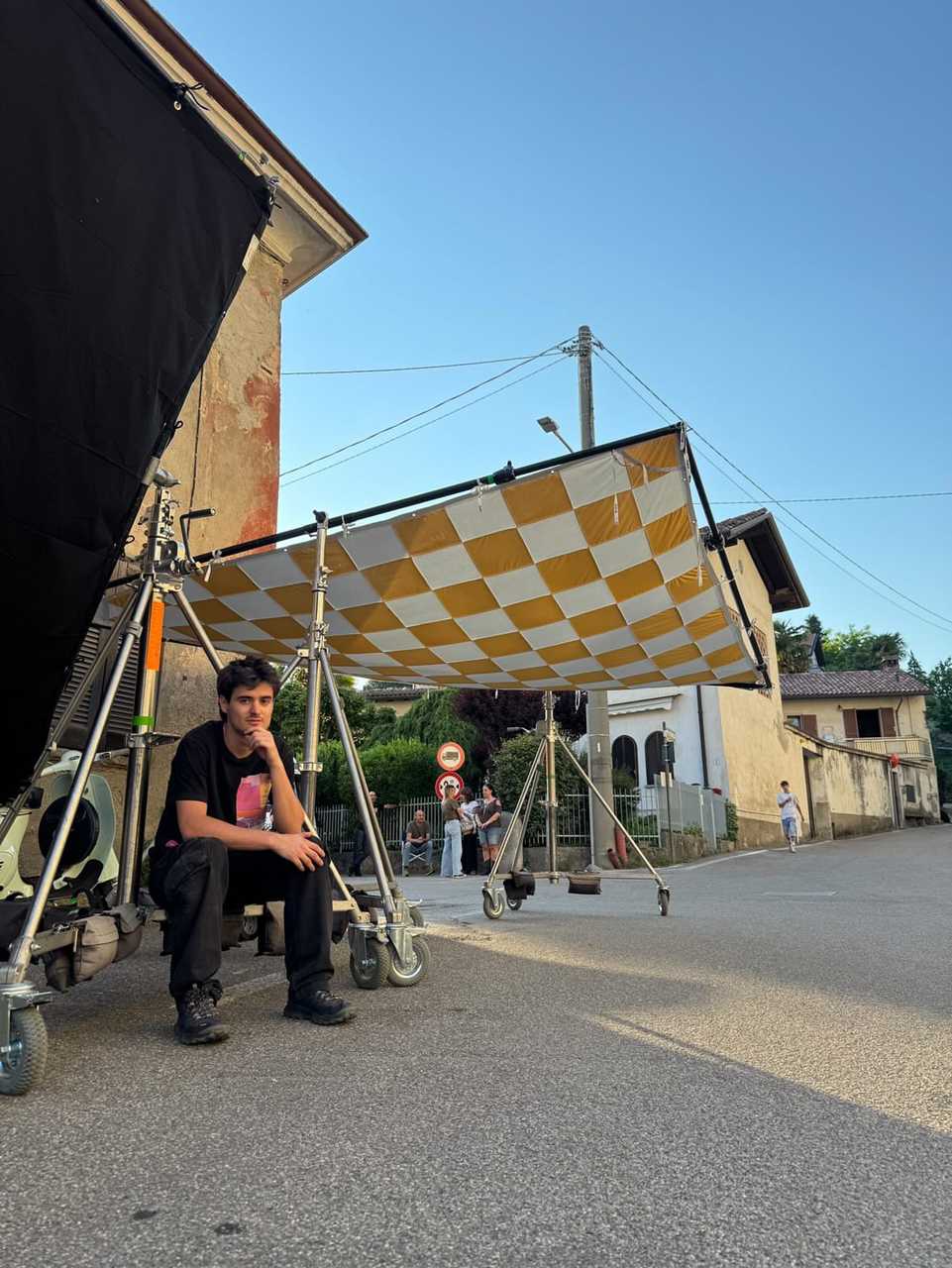 Crew resting checkered wall
