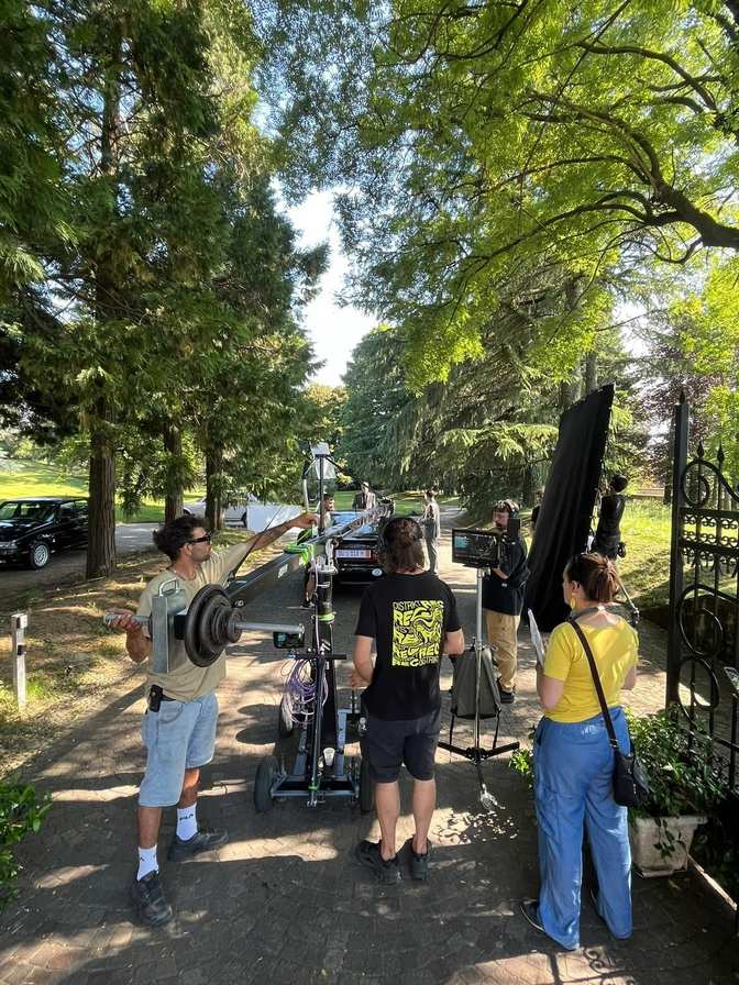 Crew walking treelined path